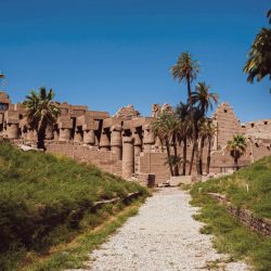 2h-media-v4tLl97tXBY-unsplash The Karnak temple complex is sprawling with gravel walkways connecting ancient structures. Karnak Temples, Karnak, Luxor, Egypt